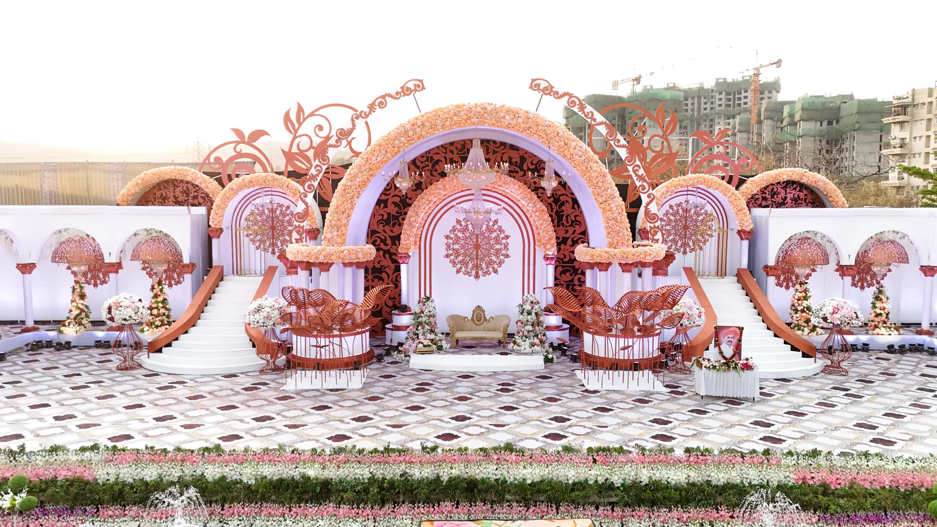 Floral arches and hanging flowers at a wedding venue